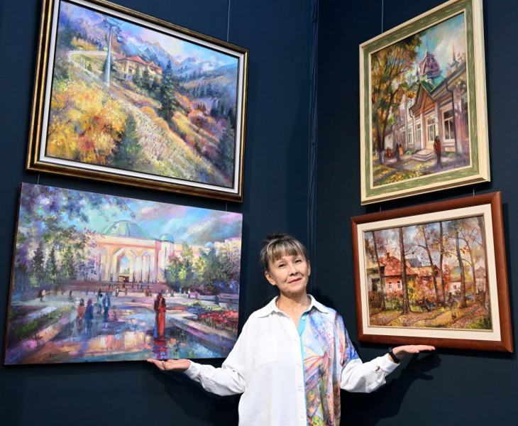 Художник рисует свой город