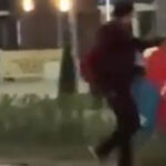 Поднявшего с земли флаг Азербайджана школьника из Туркестана пригласили в полицию
