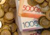 Тенге укрепляется к доллару на торгах