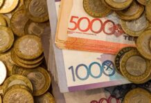 Тенге укрепляется к доллару на торгах