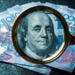 Теңге в конце недели сохранил позиции к доллару