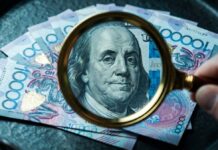 Теңге в конце недели сохранил позиции к доллару